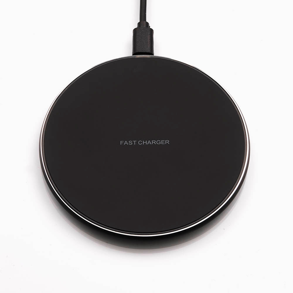 Charger for wireless charging of Qi compatible devices