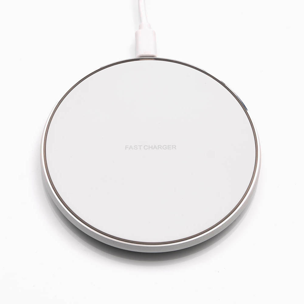 Charger for wireless charging of Qi compatible devices