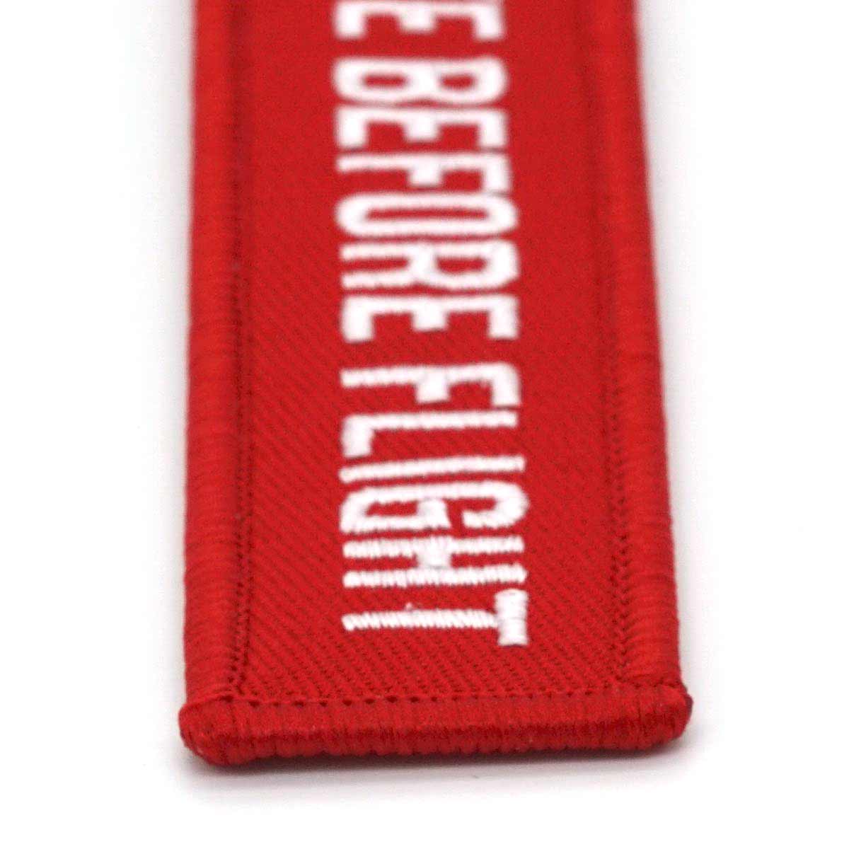 Remove Before Flight keychain