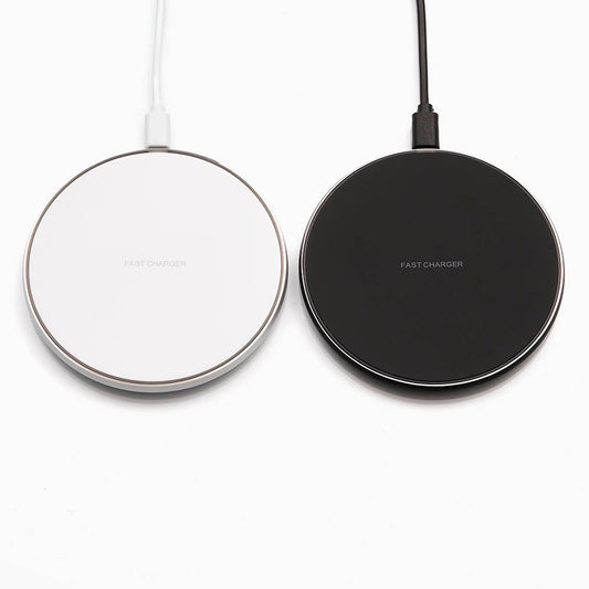 Charger for wireless charging of Qi compatible devices